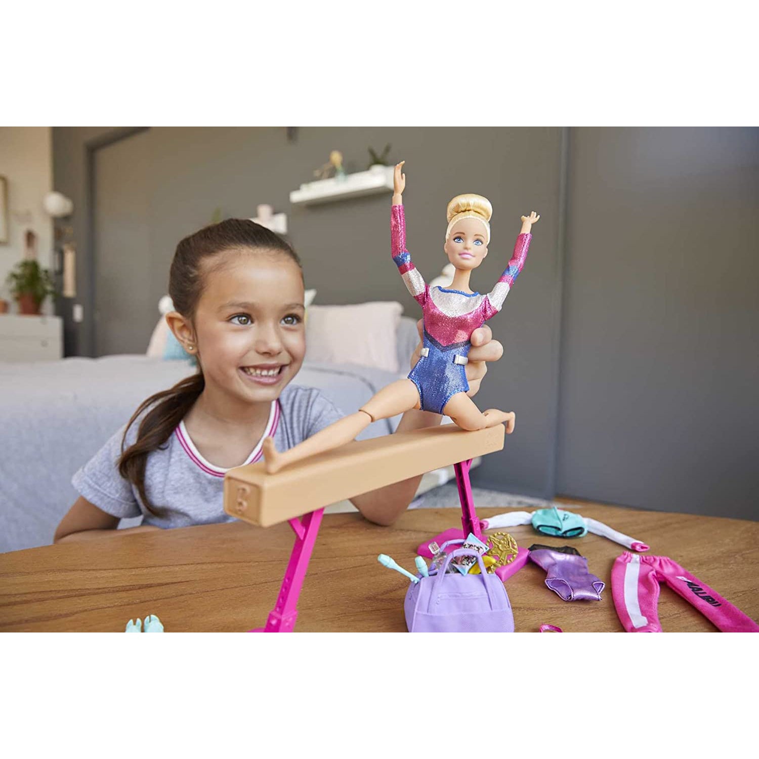 Mattel ​Barbie® Gymnastics Doll and Playset with Twirling Feature, Balance Beam, 15+ Accessori