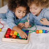 Melissa and Doug Primary Lacing Beads - Educational Toy With 30 Wooden Beads and 2 Laces