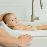 The First Years Sure Comfort® Newborn to Toddler - 3-in-1 Baby Bathtub, White