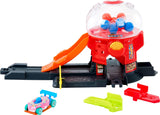 Hot Wheels Toy Car Track Set, Gumball Machine Playset with 1:64 Scale Die-Cast Donut-Shaped Vehicle &amp; Speed Snap Track, Downtown City Candy Shop