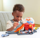 Hot Wheels Toy Car Track Set, Gumball Machine Playset with 1:64 Scale Die-Cast Donut-Shaped Vehicle &amp; Speed Snap Track, Downtown City Candy Shop